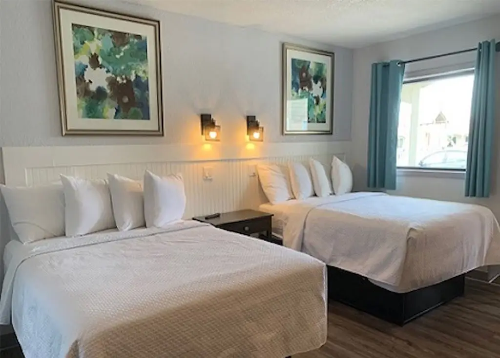 Two queen beds in a second-floor oceanfront room